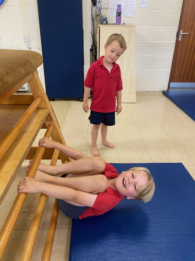 Exploring the apparatus and tackling the tuck shape!, Copthill School