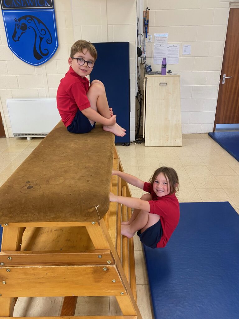 Exploring the apparatus and tackling the tuck shape!, Copthill School