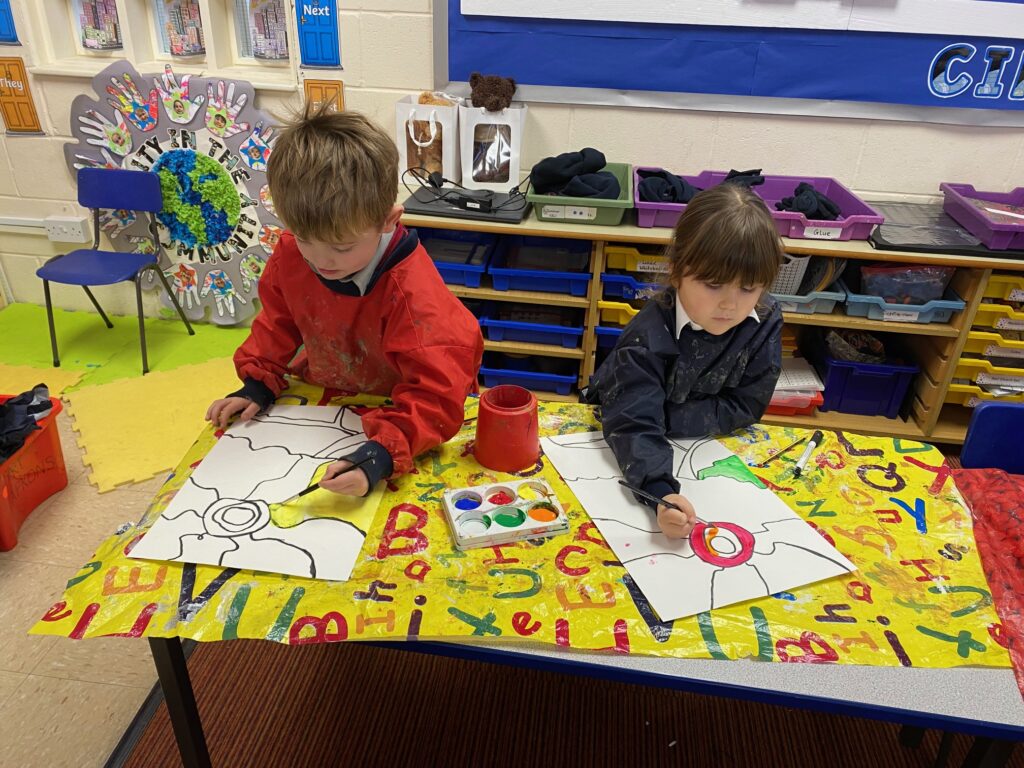 Inukshuk art in the style of Ted Harrison, Copthill School